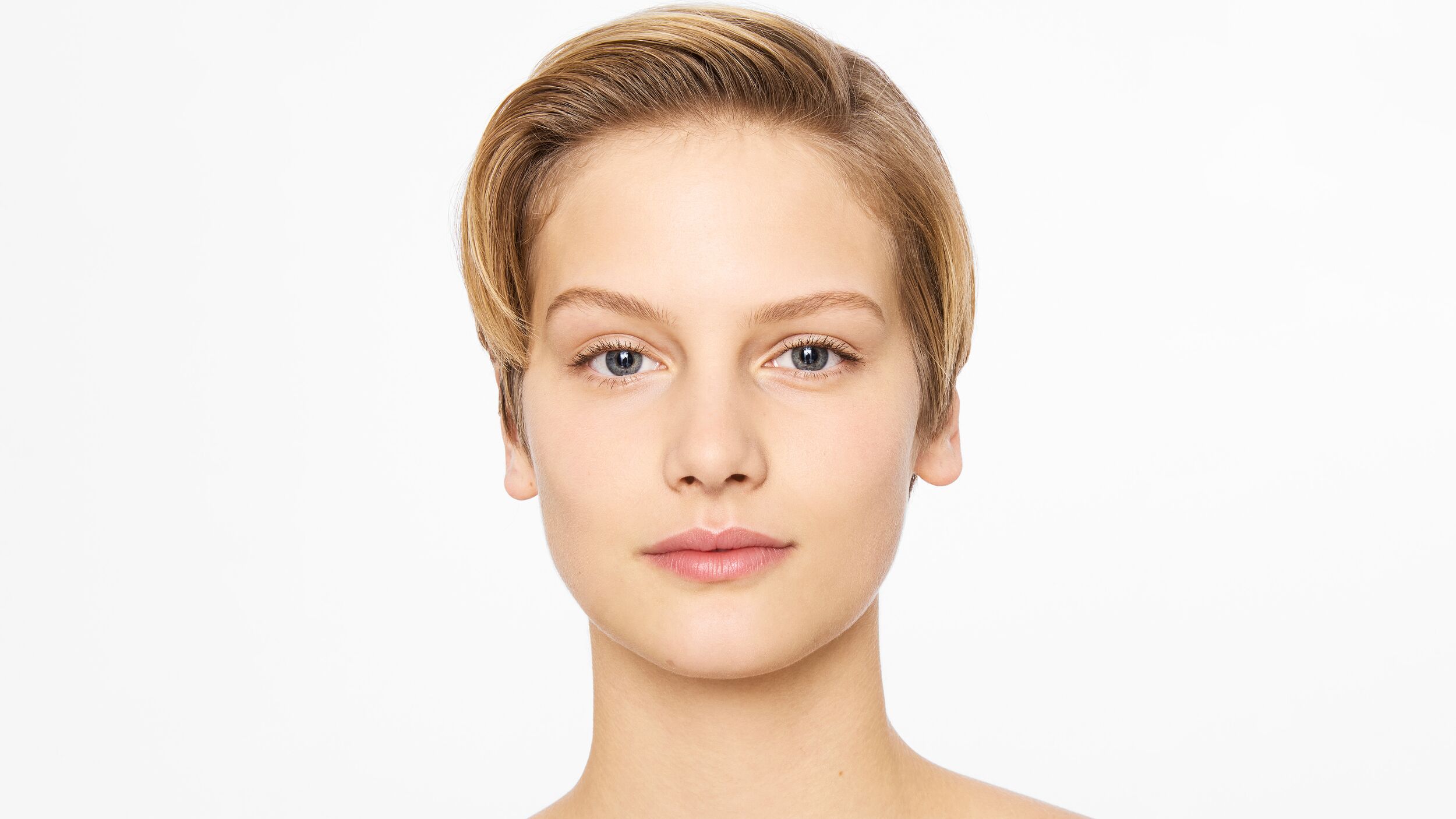 young-skincare-3.jpg Young woman looking directly at the camera