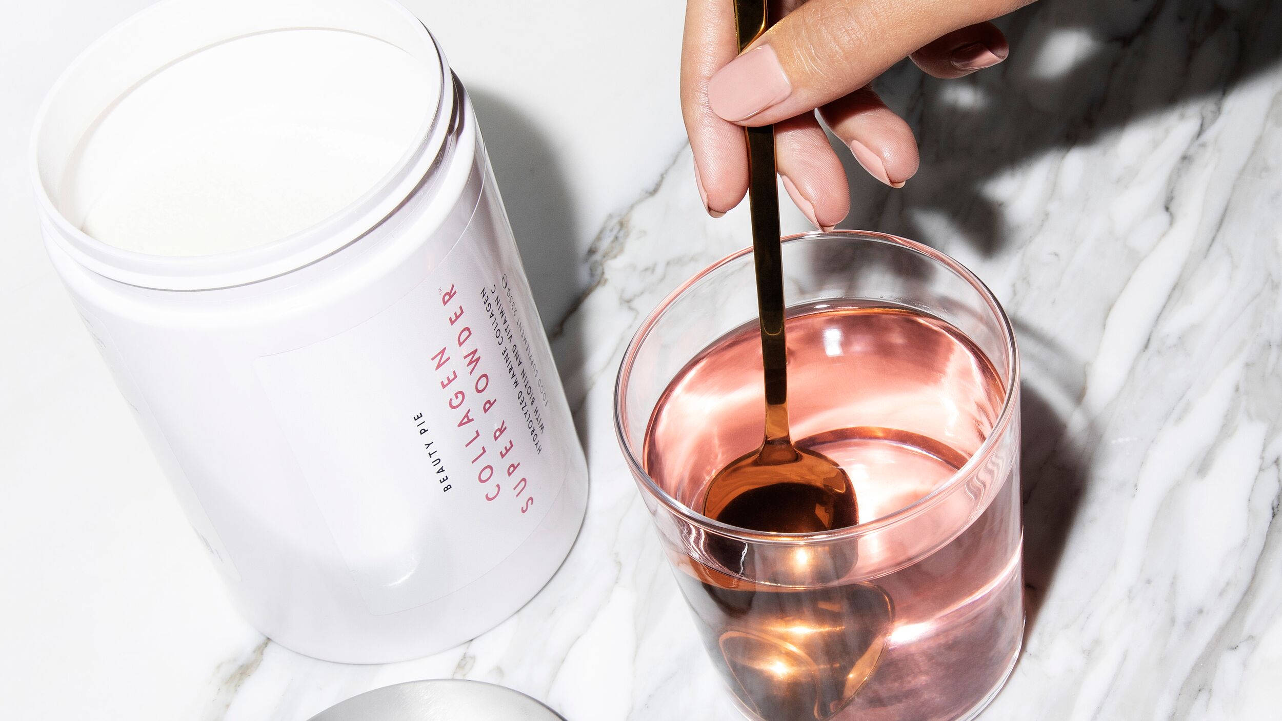 collagen-super-powder-hero.jpg BEAUTY PIE Collagen Super Powder in a glass